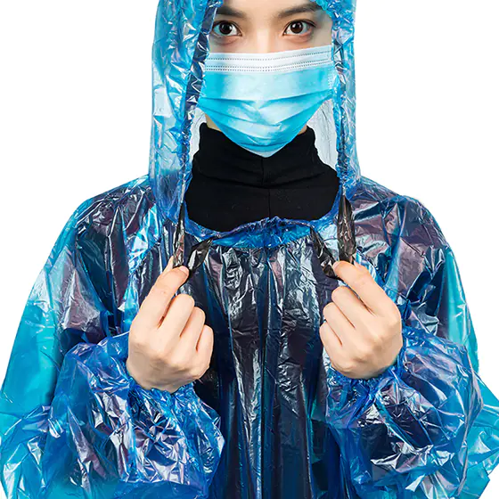 Person in blue raincoat and mask