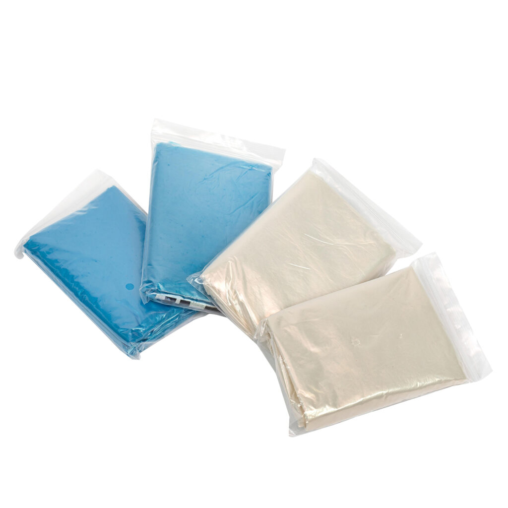 Vacuum-sealed clay packs, blue and beige colors.