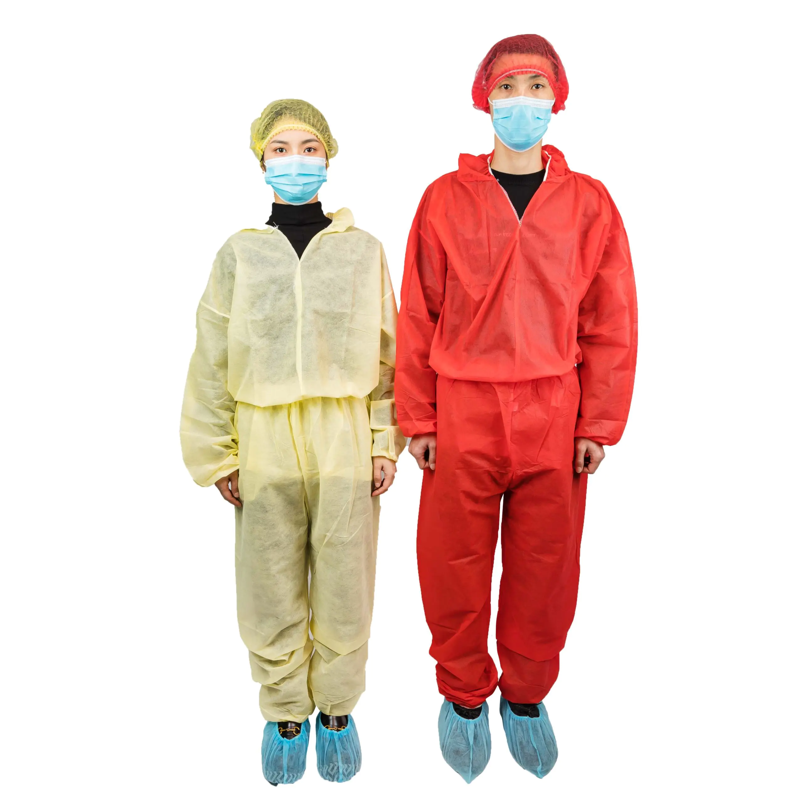 Two people in protective clothing and masks.