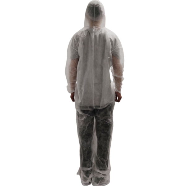 Person wearing protective disposable coverall suit.