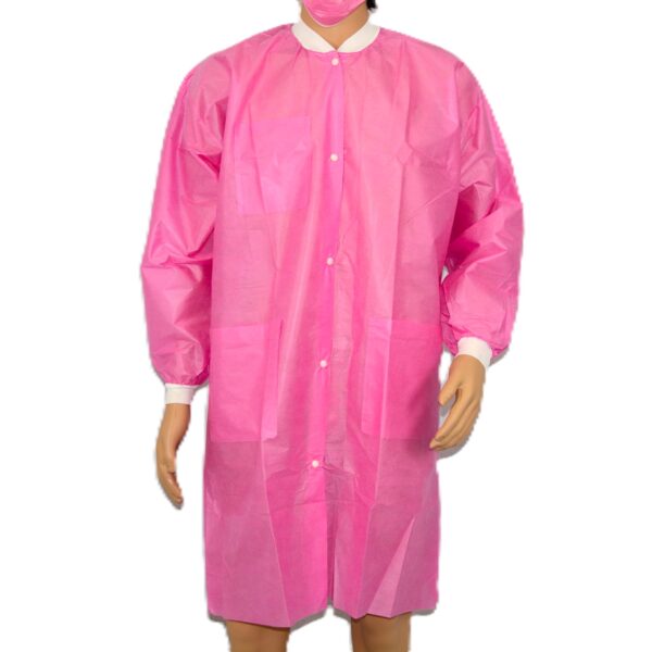 Pink disposable medical gown on mannequin