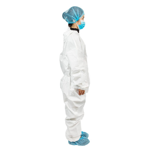 Person wearing protective coveralls and mask.