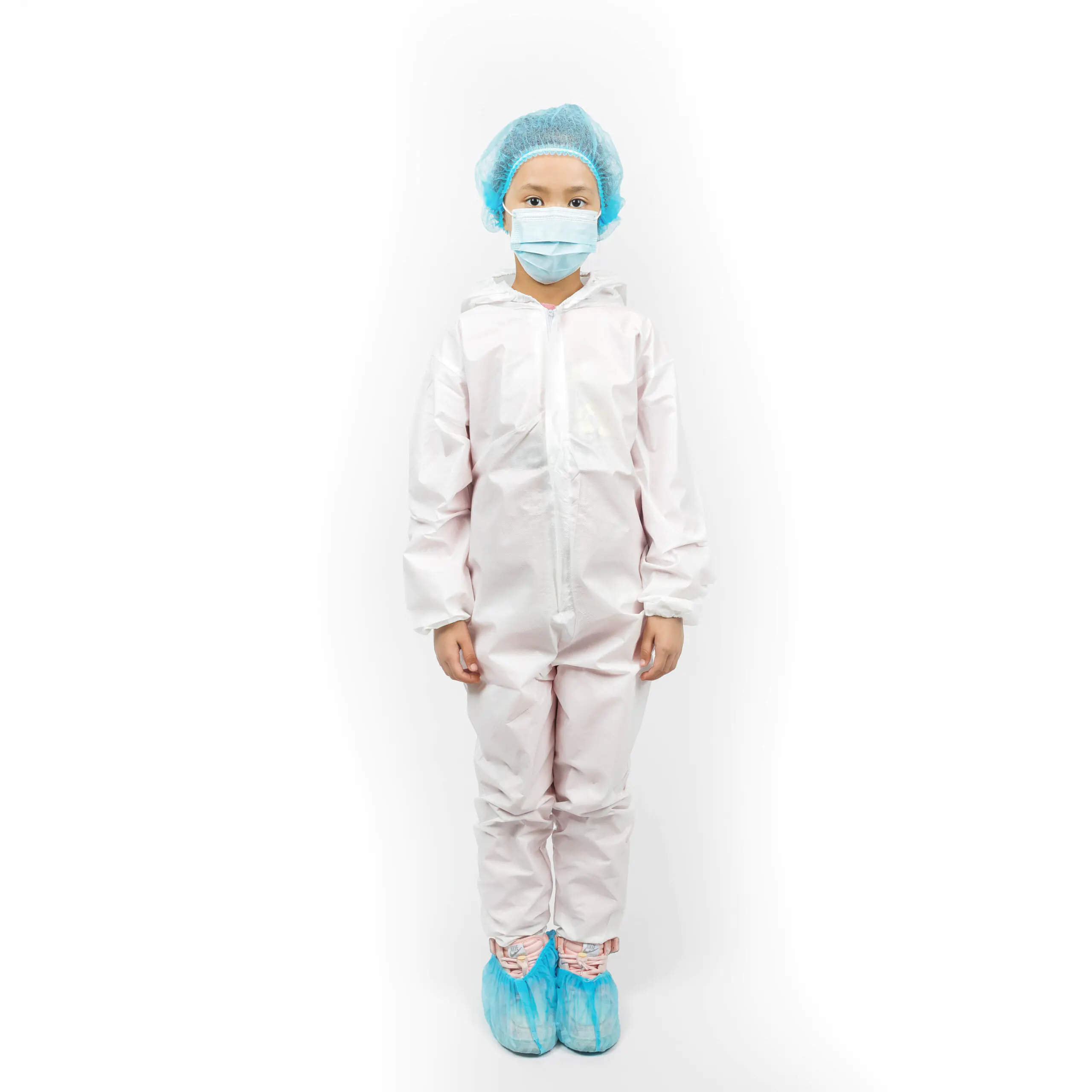 Child wearing medical protective suit and mask