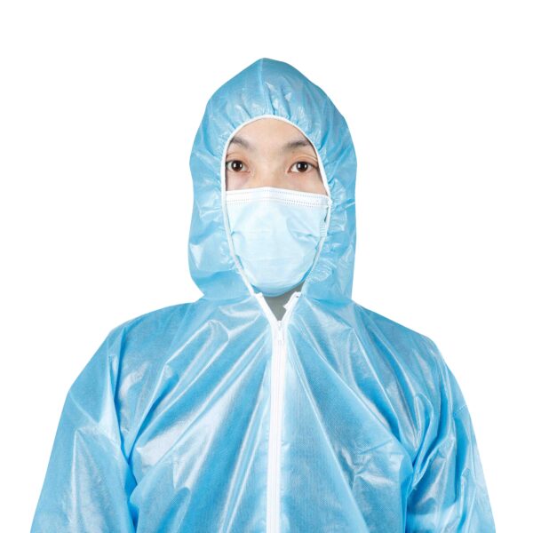 Person in blue protective suit and mask