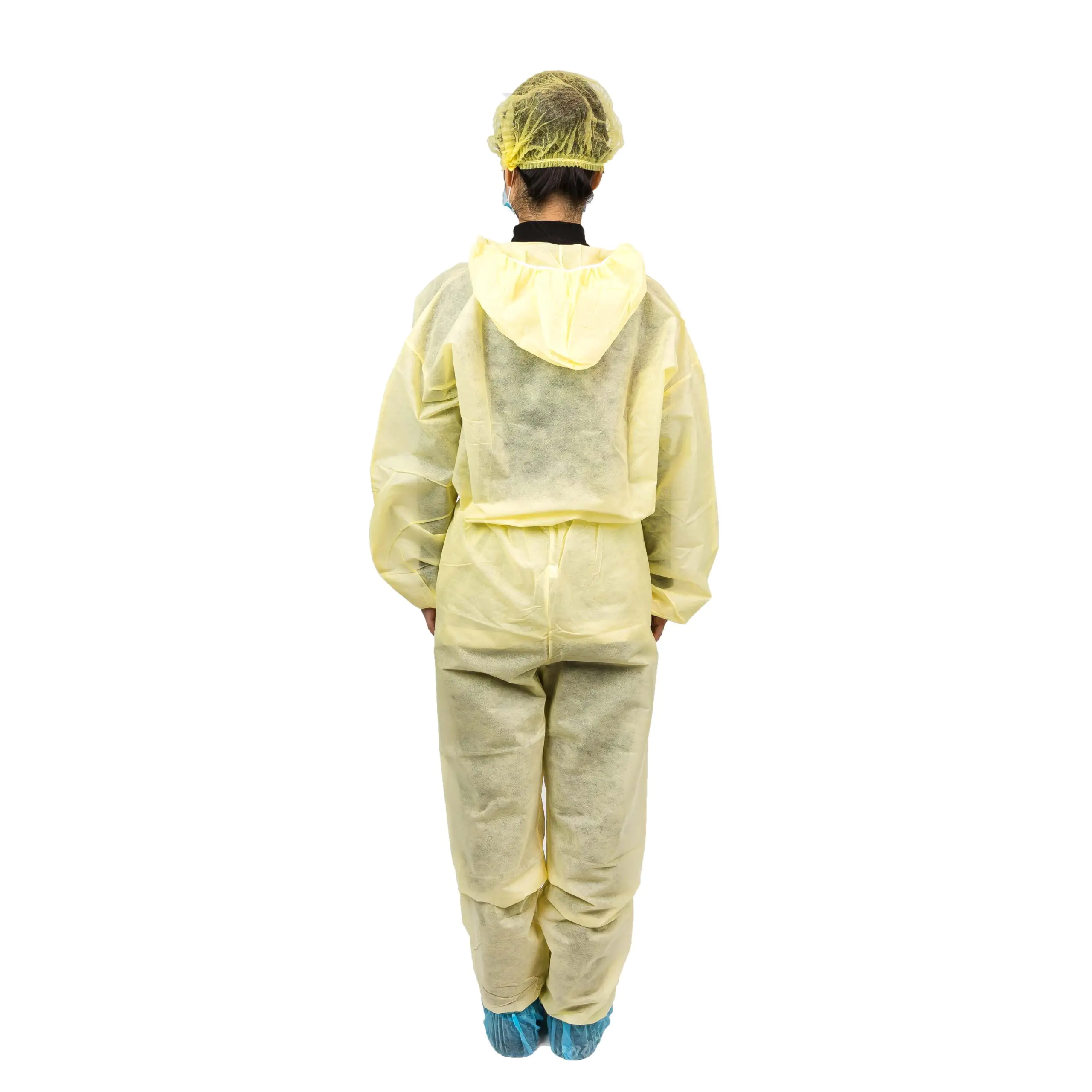 Person wearing yellow protective suit and cap.
