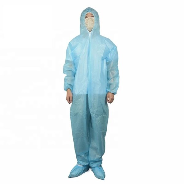 Person wearing blue protective coverall and mask