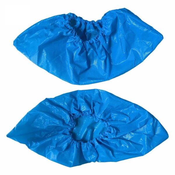 Blue disposable shoe covers on white background