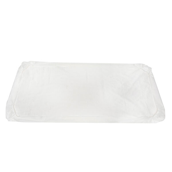 White fitted bed sheet on flat surface