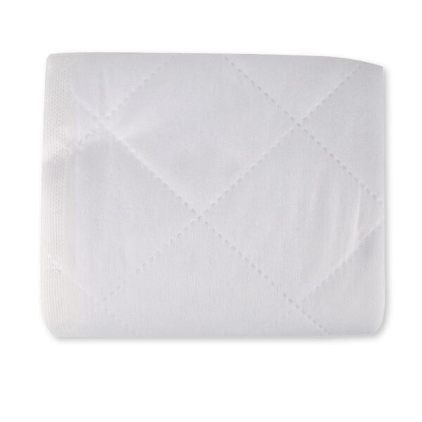 Close-up of quilted white paper towel.