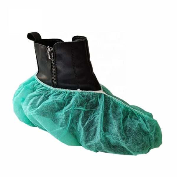 Boot with teal disposable shoe cover