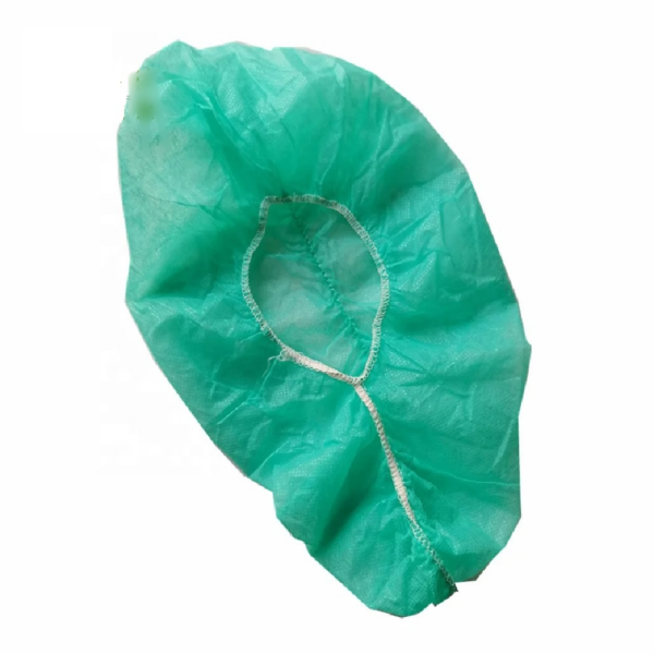 Disposable green medical bouffant cap