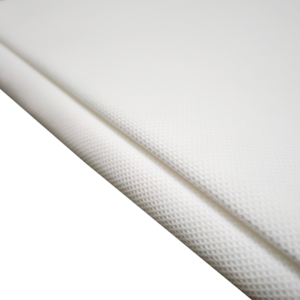 Close-up of white textured fabric