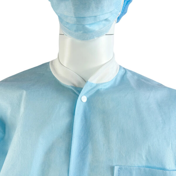 Mannequin wearing blue surgical gown and mask