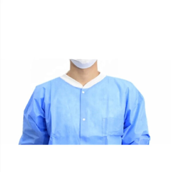 Person wearing blue medical gown and mask.