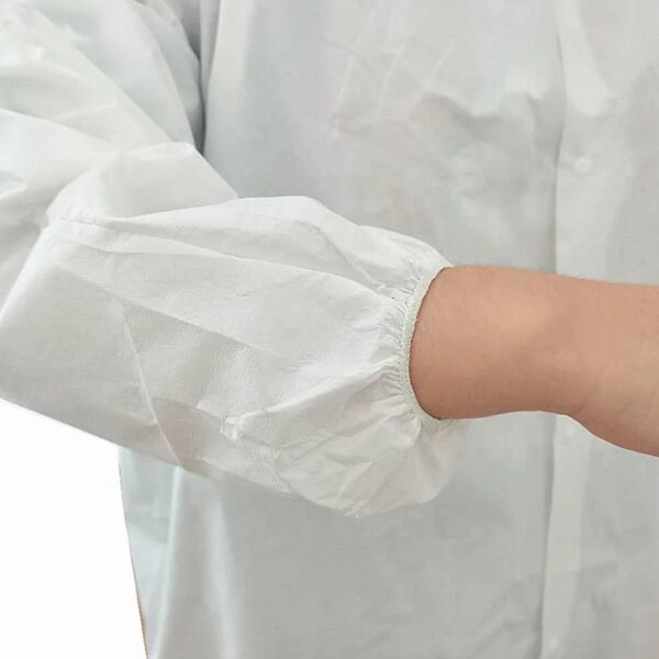 Person wearing white protective lab coat