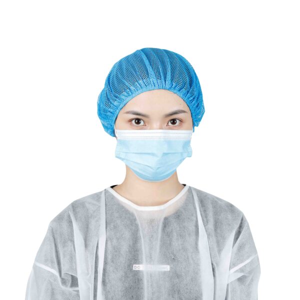 Medical professional wearing mask and cap