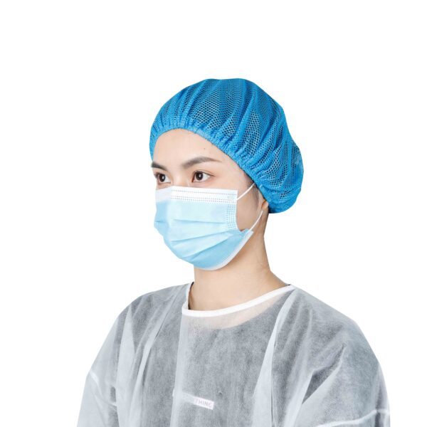 Person wearing medical mask and cap