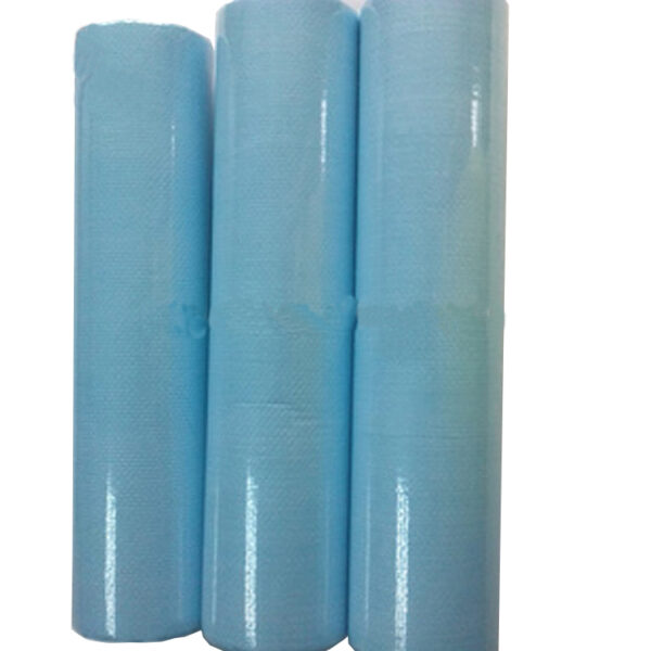 Three blue rolls of non-woven fabric material