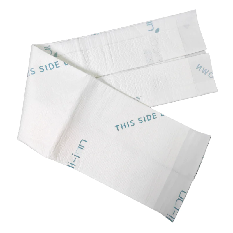 Toilet seat cover with instructions: 'This side down'.