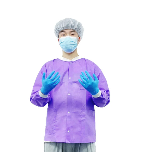 Person in protective clothing and gloves