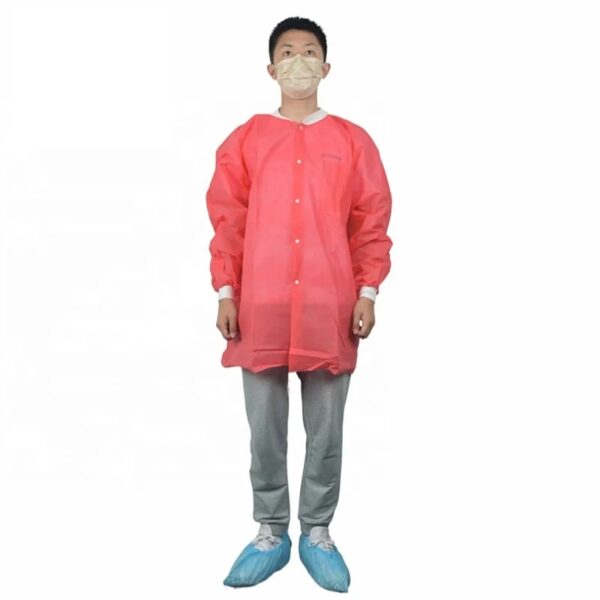 Person wearing red medical gown and mask