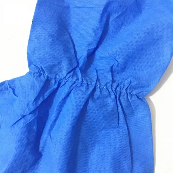 Close-up of blue disposable fabric with elastic seam.