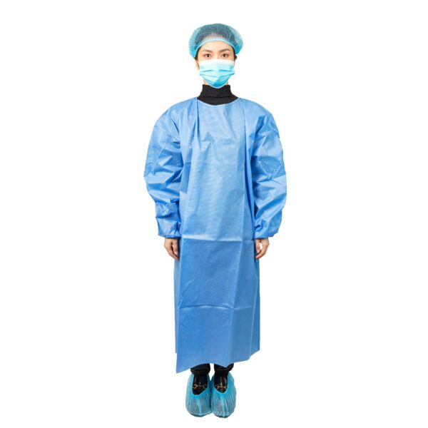 Person wearing blue medical gown and mask.