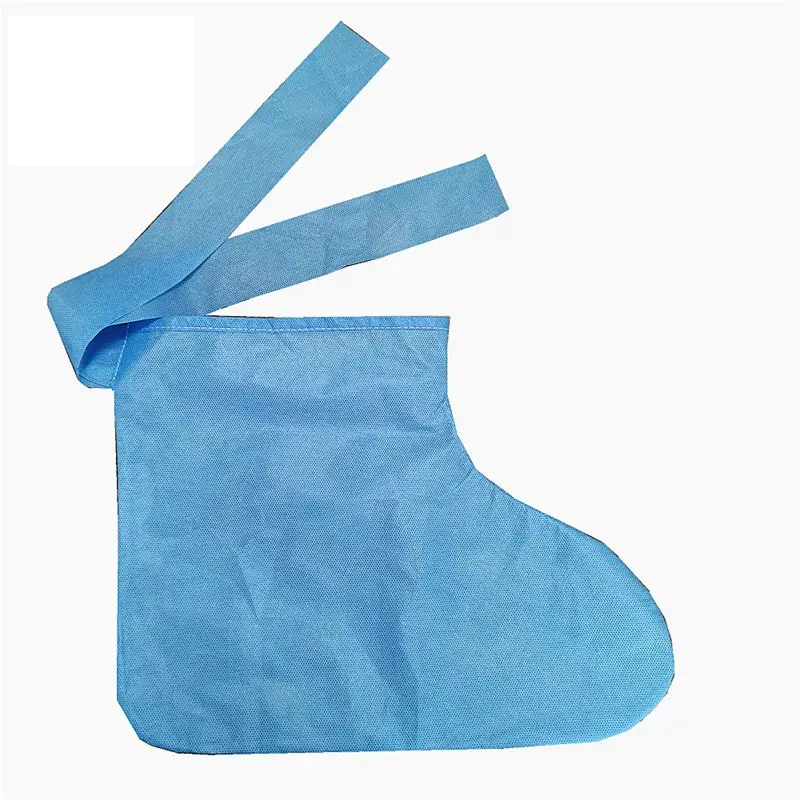 Blue disposable shoe cover with ties.