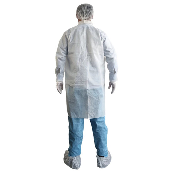 Person in disposable protective clothing, back view