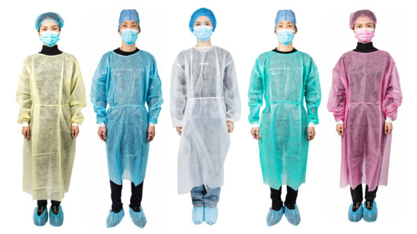 Five people in colored disposable protective gowns.