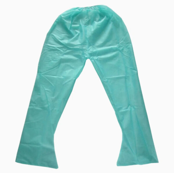 Green disposable surgical pants on white background.