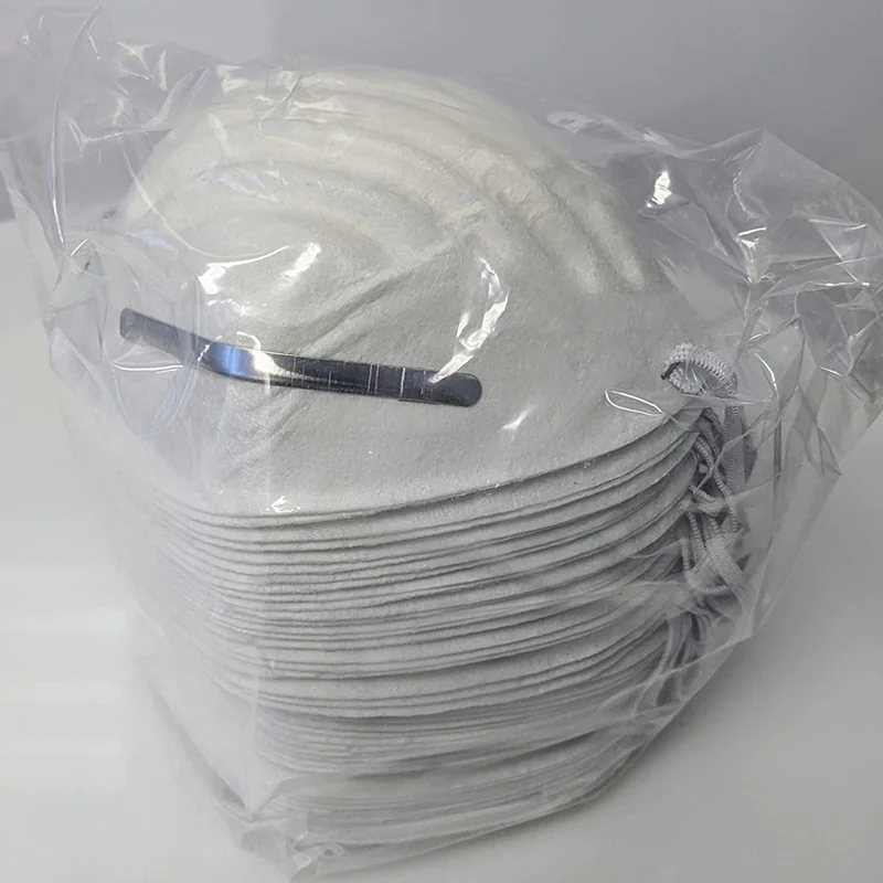 Pack of disposable face masks in plastic wrap.