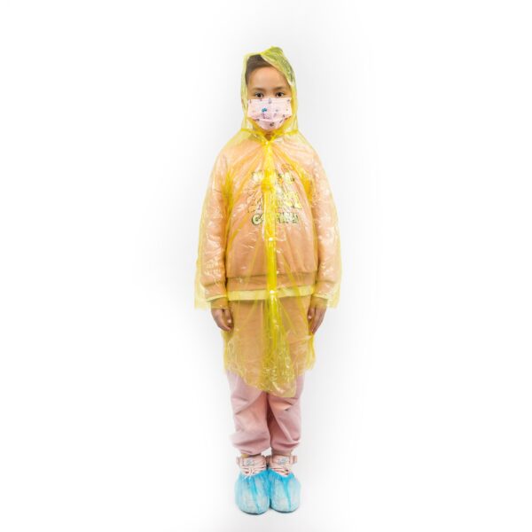 Child in yellow raincoat with face mask.