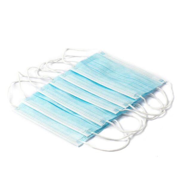 Stack of blue disposable face masks