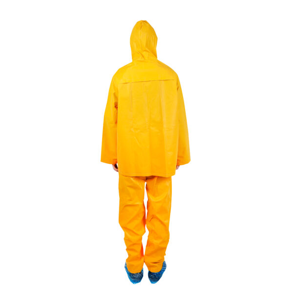 Person wearing a bright yellow raincoat and pants