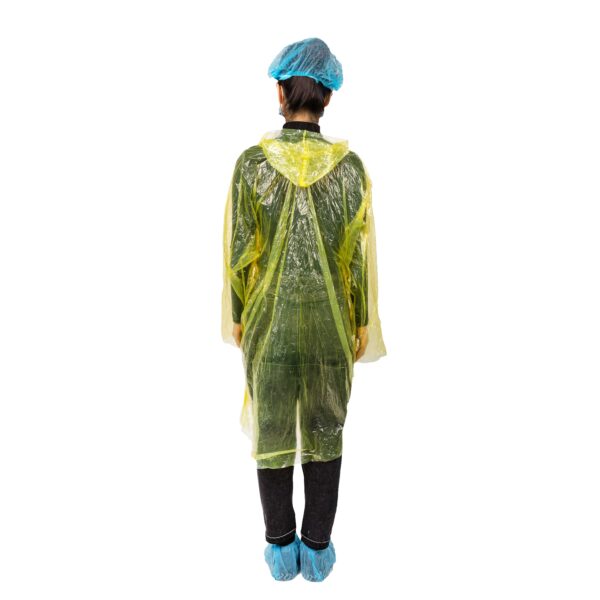 Person wearing yellow raincoat and blue shoe covers