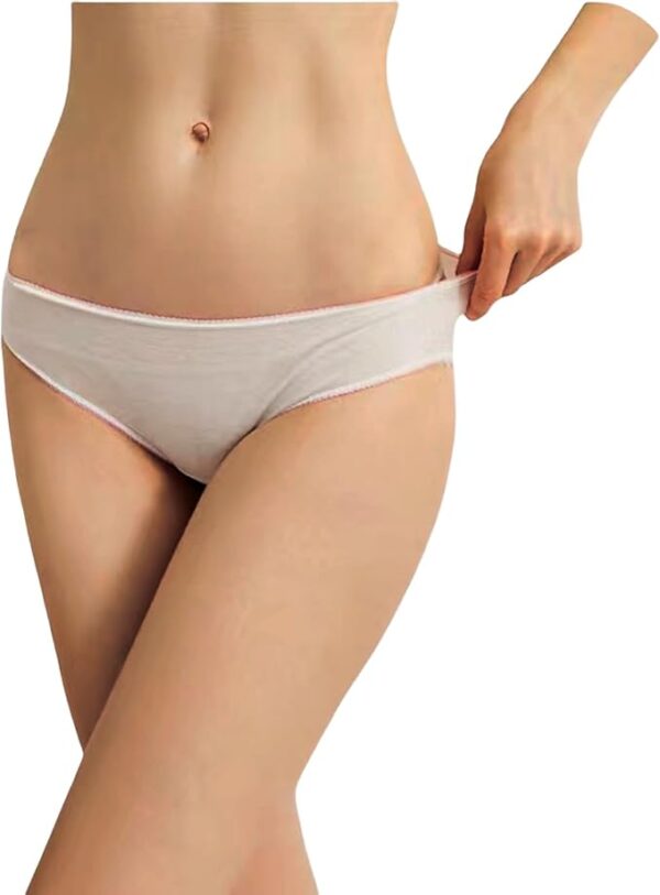 Woman in white underwear on white background