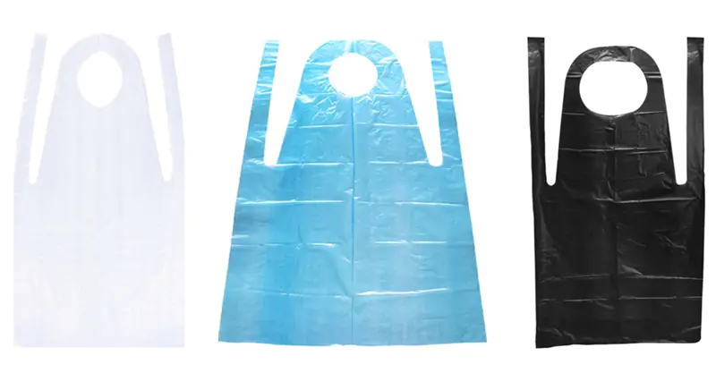 Three disposable plastic aprons in different colors