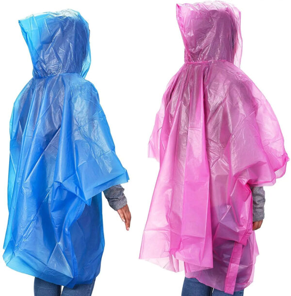 People wearing blue and pink rain ponchos.