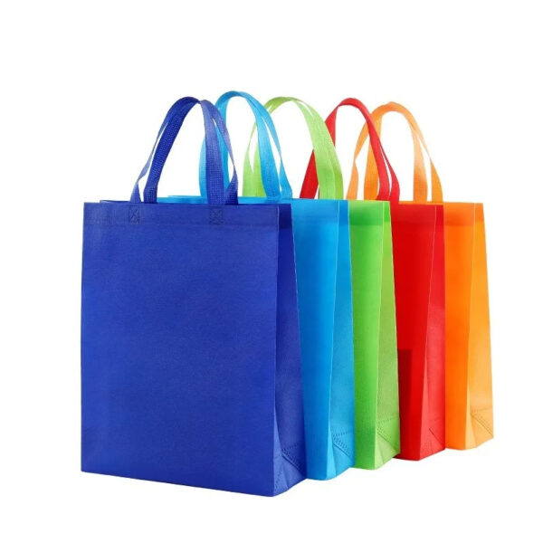 Colorful reusable shopping bags lined up.