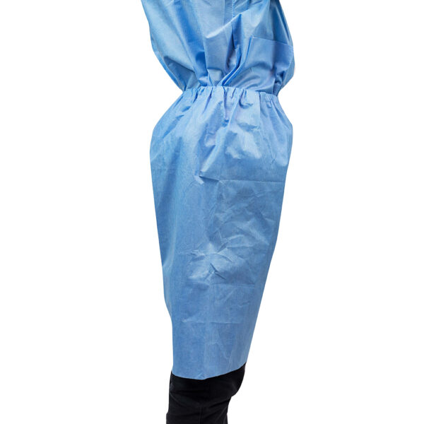 Person wearing blue protective gown