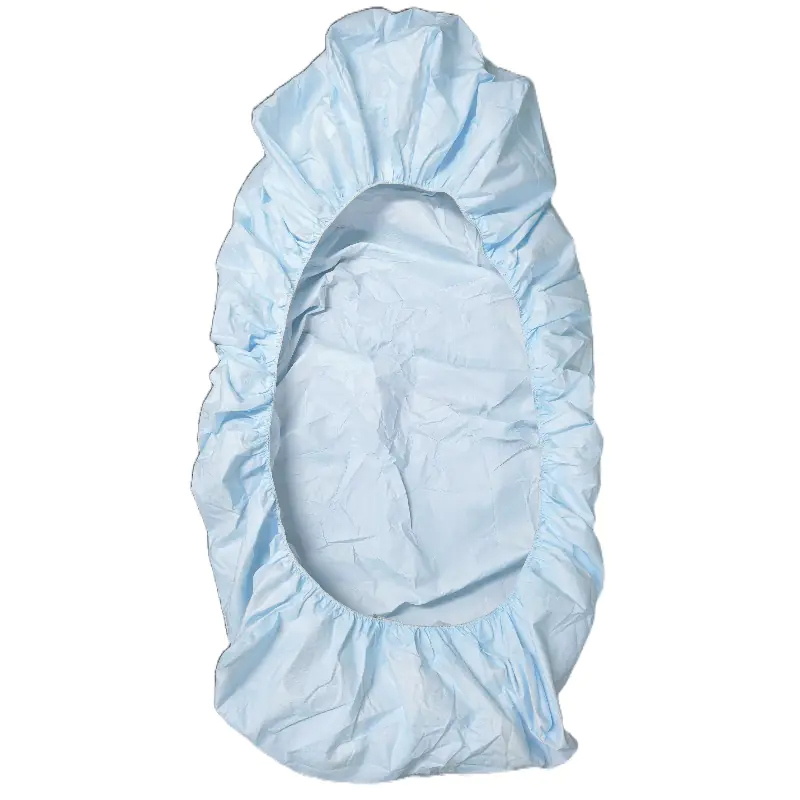 Blue disposable hair cap for hygiene use.
