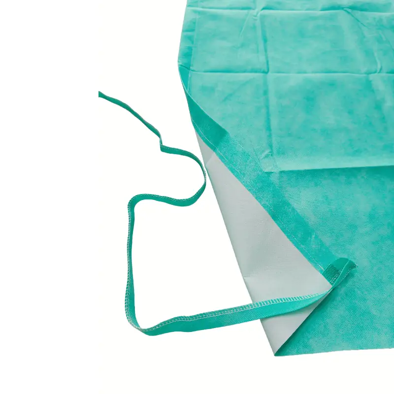 Disposable teal sheet with strap, medical use.