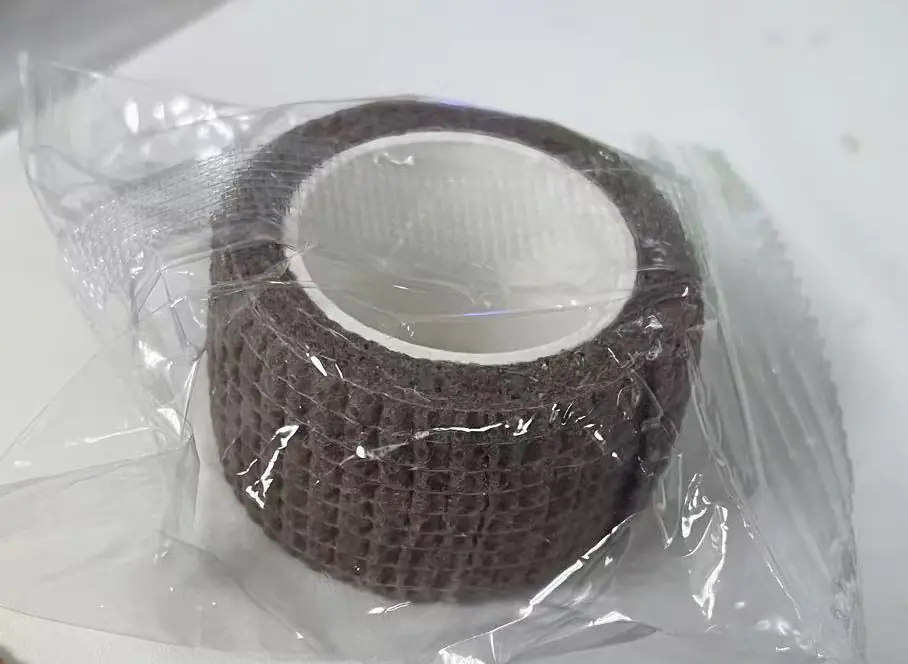 Brown mesh roll wrapped in plastic packaging