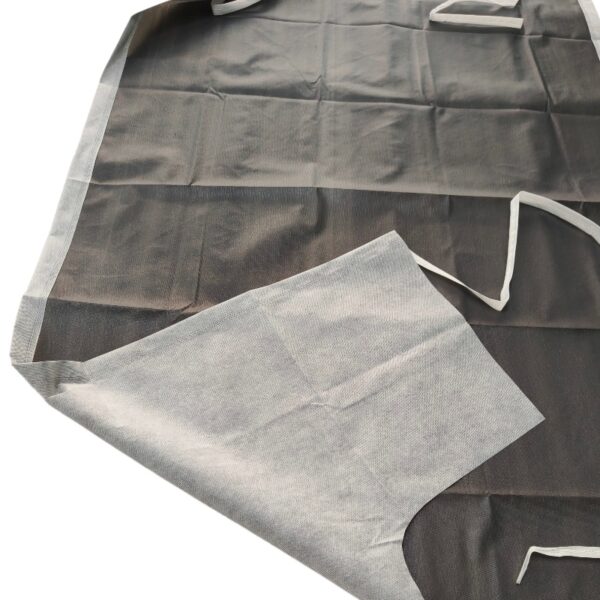 Gray non-woven fabric with folded edges and ties.