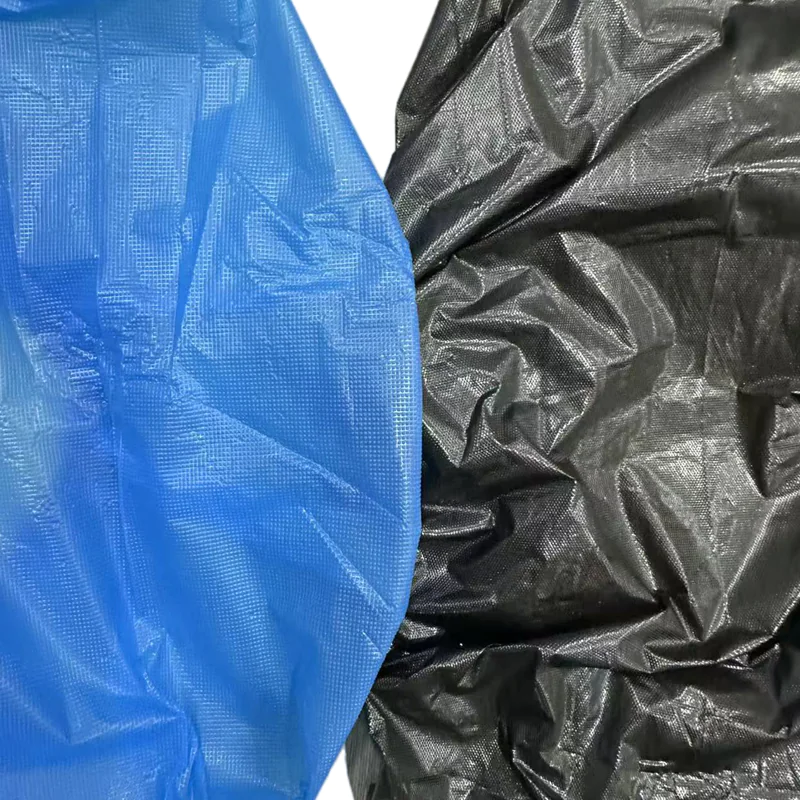 Blue and black crumpled plastic sheets.