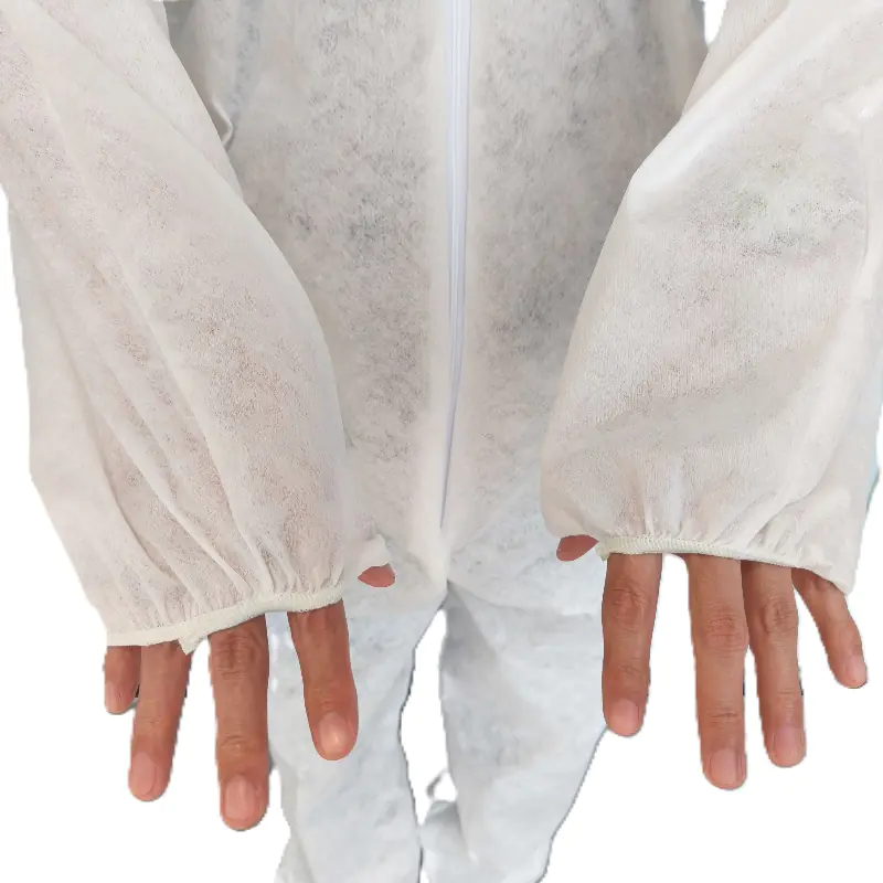 Person wearing white protective coveralls.